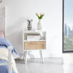 White rattan end table with drawer and solid wood legs, modern nightstand for bedroom or living room