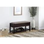 White storage bench with padded seat and shoe shelf in entryway