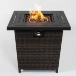 Square propane fire pit table with wicker base on patio