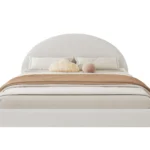 Goldoma adjustable bed frame king with soft boucle upholstered curved headboard and eco-friendly wood frame in a modern bedroom