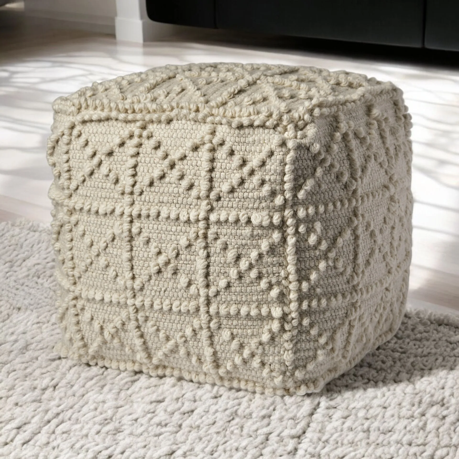 Hd722c8c5f0f3496bb6c3c2af54062fc5O.webp Goldoma 18 inch ivory wool knubby geometric cube pouf ottoman with leather handle