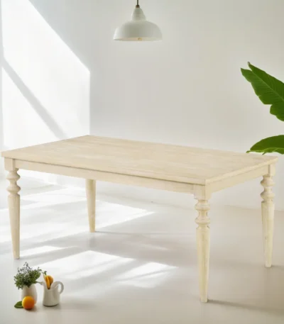 Urban style wired white dining table with turned legs and wood grain finish in a modern home setting