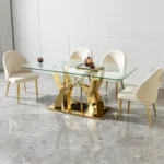 Modern glass dining table with stainless steel legs and clear tempered glass top