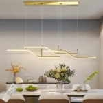 Detailed view of the LED module and suspension cables of the linear chandelier.
