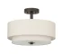 Semi flush 2-tier fabric ceiling pendant light in beige, hanging in a living room with soft natural light.