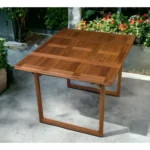Brown foldable solid wood outdoor dining table on patio