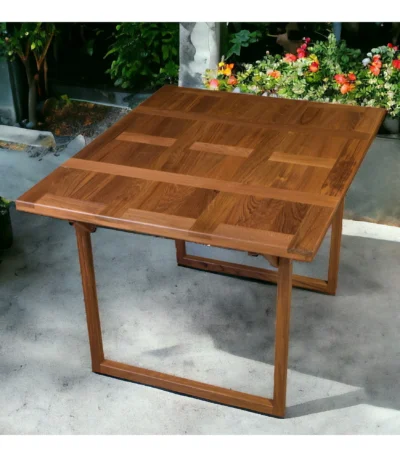 Brown foldable solid wood outdoor dining table on patio