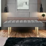 Goldoma 53 inch light gray velvet bench with gold metal frame in a bedroom setting