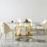 Modern glass dining table with stainless steel legs and clear tempered glass top