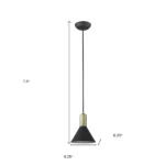 HMS pendant light suspended in a corner of a contemporary living room, complementing neutral decor and wooden furniture.