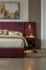 Goldoma velvet storage bed with channel tufted wingback headboard in blue, showing under-bed storage and wooden slats