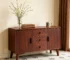 Mid century sideboard with two doors and three drawers in a modern dining room