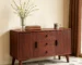 Mid century sideboard with two doors and three drawers in a modern dining room