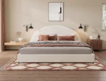 Goldoma adjustable bed frame king with soft boucle upholstered curved headboard and eco-friendly wood frame in a modern bedroom