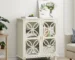 Modern solid wood sideboard with tempered glass doors in a dining room