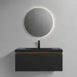 The 36-inch PVC bathroom vanity cabinet set in a modern apartment bathroom, paired with a mirror and lighting.