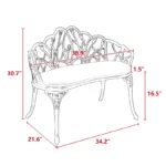 Black cast aluminum bench with floral rose design in a garden setting