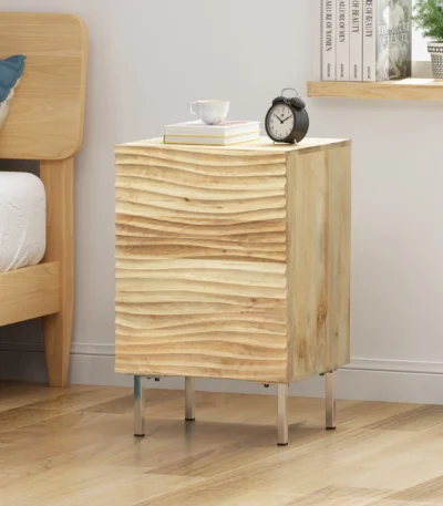 Natural wood nightstand with wavy front and metal legs in a modern bedroom setting