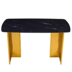 Modern glass dining table set with marble pattern and gold metal legs in a dining room setting