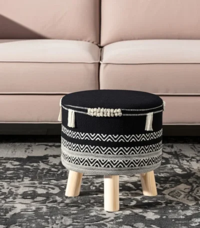 Goldoma 16-inch round chevron ottoman in black and white cotton upholstery with wooden legs