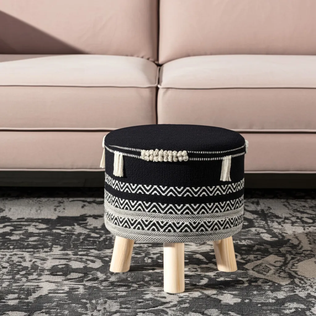 Hdcf40b41c22246859834f0c4206c1c09B.webp Goldoma 16-inch round chevron ottoman in black and white cotton upholstery with wooden legs