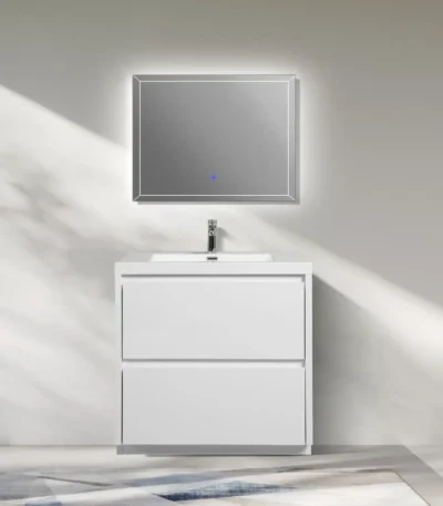 Modern freestanding bathroom vanity with glossy white MFC cabinet and marble countertop, placed in a bright bathroom