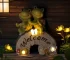 Solar turtle statue glowing in garden at night