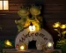 Solar turtle statue glowing in garden at night