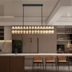 Close-up of the black metal frame and clear crystal accents on the Goldoma hanging light