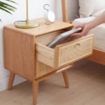 Solid oak bedside cabinet with rattan drawers in modern Nordic style