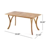 Goldoma 59-inch outdoor solid wood dining table with teak finish on patio