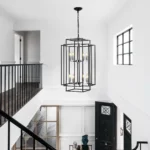 The 18-inch chandelier hanging at different heights, with a focus on the adjustable hanging mechanism and metal texture