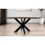 72 inch round dining table with gray beige solid wood top and black iron pedestal base in a dining room setting