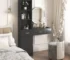Modern black makeup vanity desk with multi-layer storage and mirror