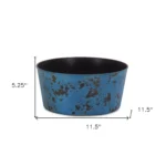 Large blue planter with powder-coated finish on a patio