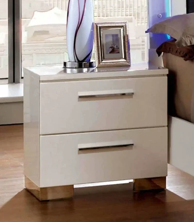 Glossy white nightstand with two drawers and chrome handles - contemporary bedroom furniture by Goldoma