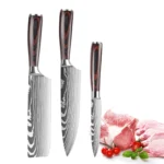 Japanese kitchen knife set with three knives on wooden cutting board