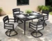 5-piece aluminum outdoor dining set with swivel rockers and glass table on a patio