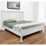 Goldoma white carved geometric distressed solid wood king bed frame in bedroom