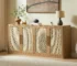 Modern rattan sideboard buffet with four doors and natural wood finish in a living room setting