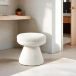 Adjustable velvet mushroom ottoman in a modern living room setting, plush round seat with wooden legs