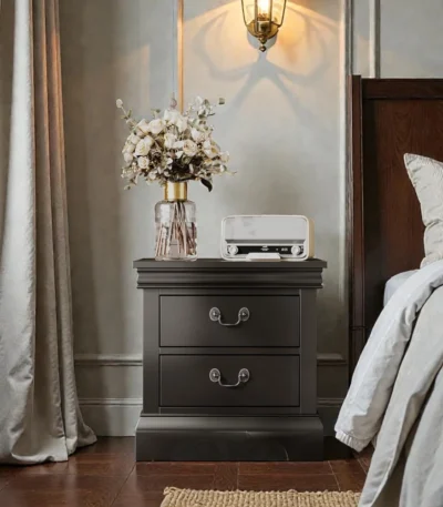 Classic wooden nightstand black with two drawers in a bedroom setting