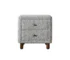 Cleo Gray boucle nightstand with drawers and wooden legs in a cozy bedroom setting