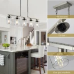 Angled view of the chandelier hanging over a kitchen island, brushed nickel arms and clear shades visible.