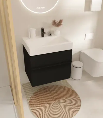 White wall-mounted bathroom vanity cabinet with wooden finish, closed doors, and a marble countertop in a bright