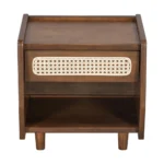 Walnut nightstand with rattan detail featuring a drawer and open shelf in a modern bedroom setting
