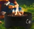 Portable propane fire pit 15 inch round stainless steel with flames