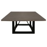 Goldoma 60-inch solid wood square dining table with dark brown distressed top and black iron legs in a rustic dining room