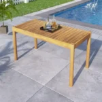 Goldoma outdoor dining table solid acacia wood light teak finish on patio