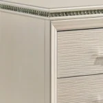 Goldoma traditional 2-drawer nightstand with diamond clear acrylic legs in pearl white finish placed next to a bed